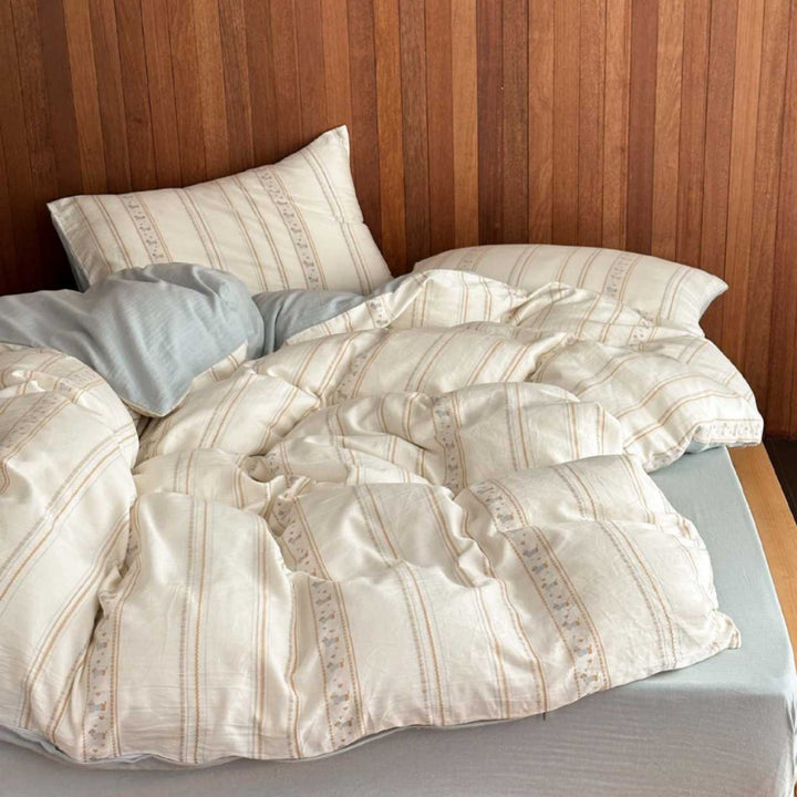 Reversible cotton bedding set with fine stripe and ethnic pattern