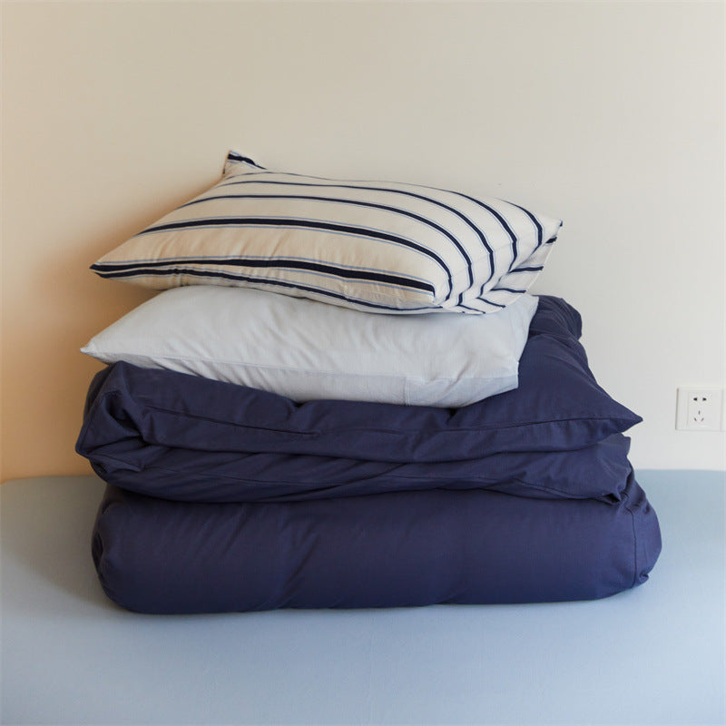 Bedding set made of cotton percale with striped pillowcase and smooth duvet cover