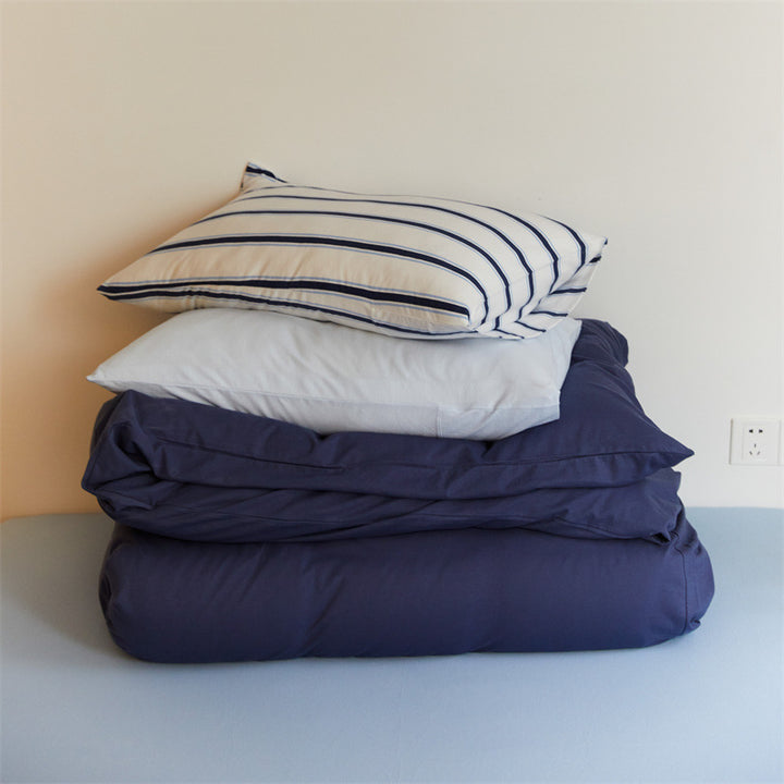 Bedding set made of cotton percale with striped pillowcase and smooth duvet cover