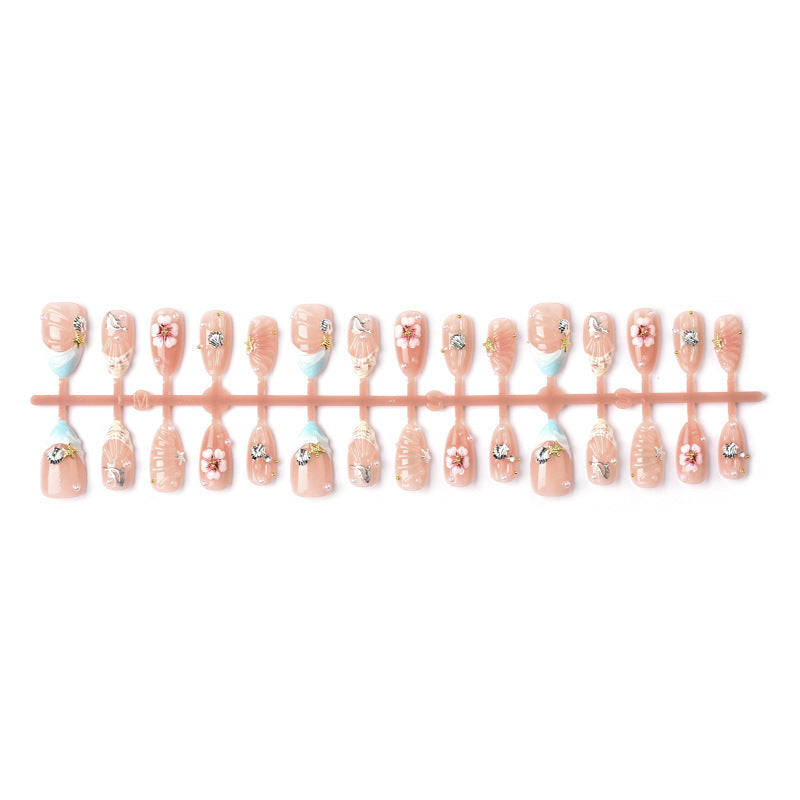 Acrylic nail set with filigree shell and flower decorations Kalsten
