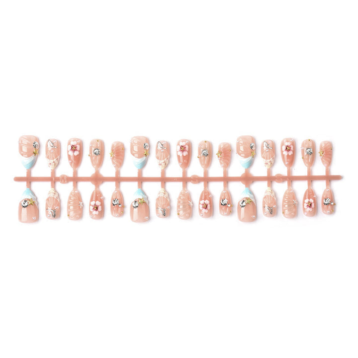 Acrylic nail set with filigree shell and flower decorations Kalsten