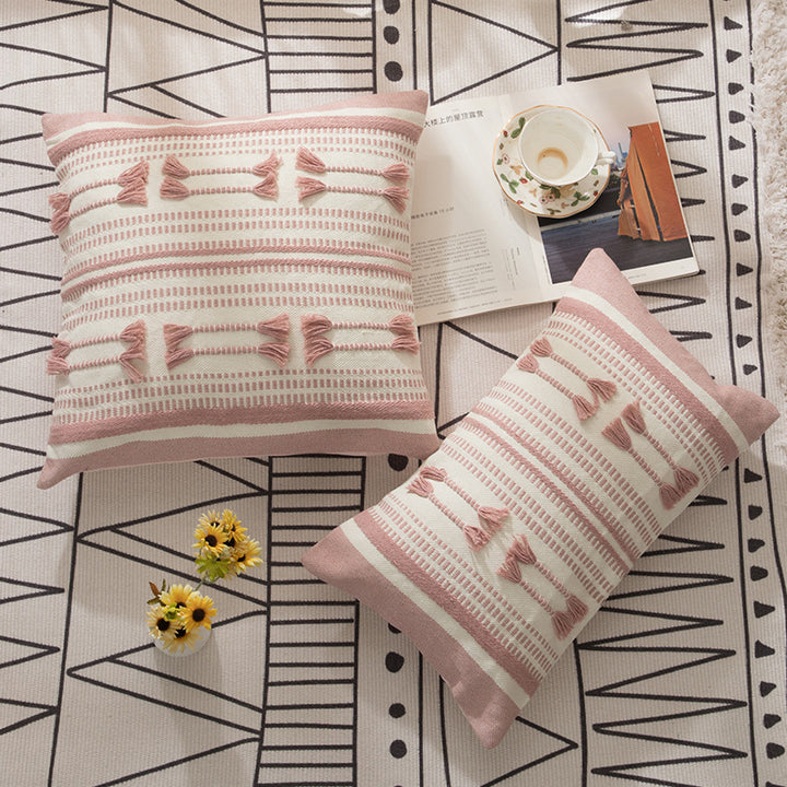 Woven decorative cushion cover with ordered tassel application and structured jacquard weaving Kalsten