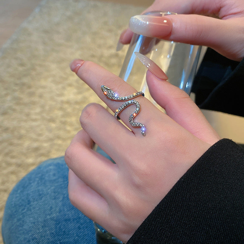 Elegant snake ring with sparkling zirconia stones Kalsten