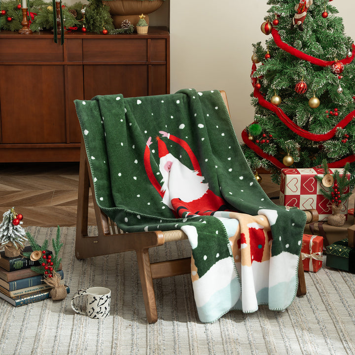 Christmas cuddle blanket with gift and gingerbread pattern