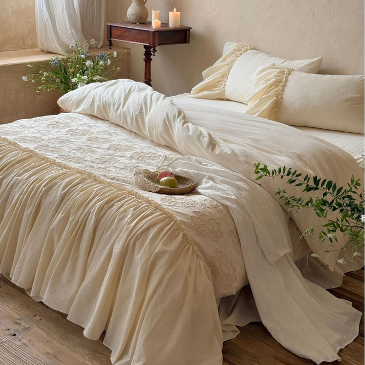 Vintage bedding set with ruffled bed skirt and embroidered bedspread