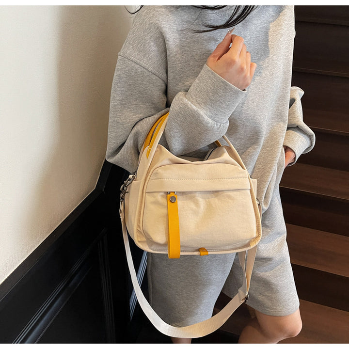 Fashionable shoulder bag with innovative structure and detachable carrying strap Kalsten
