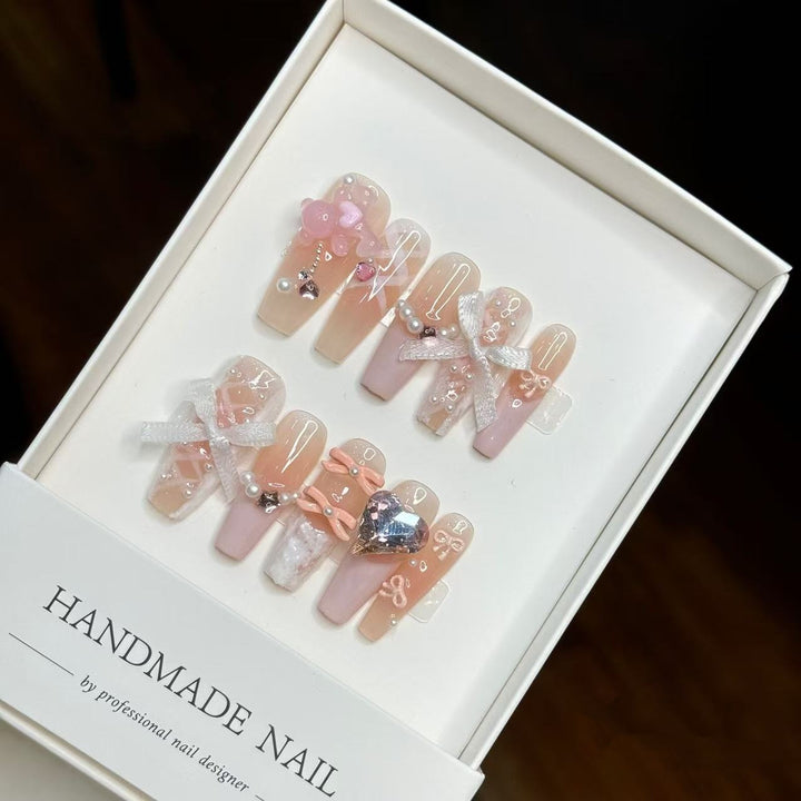 Artistic Press-On Nail Set with Decorative Bow and Gem Accents