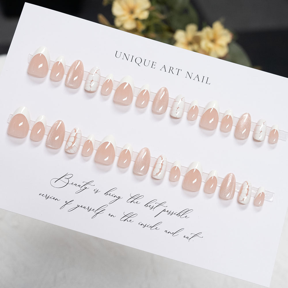 Artistic Press-On Nail Set with Elegant French Tips and Glitter Accents