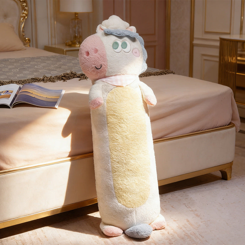 Oversized plush body pillow in cow design with supportive filling and removable cover
