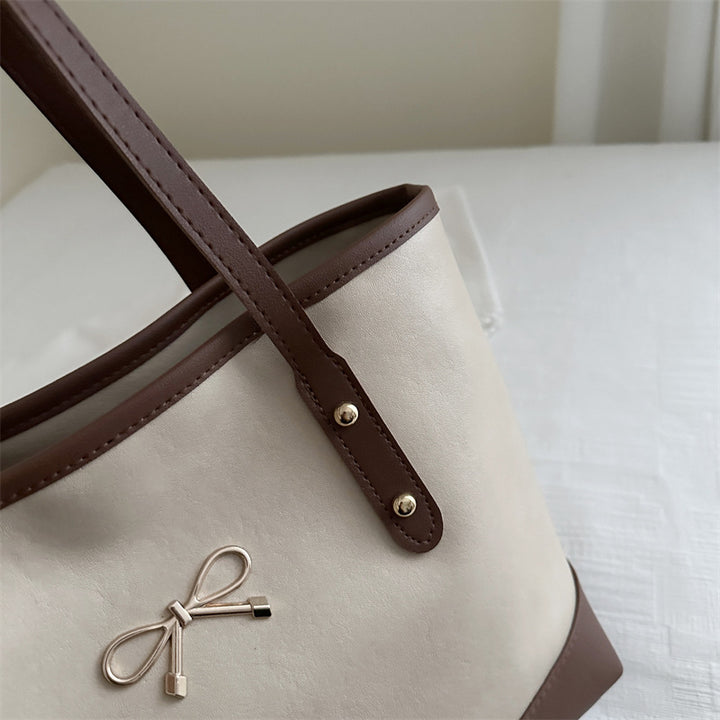Elegant Faux Leather Tote Bag with Accent Bow