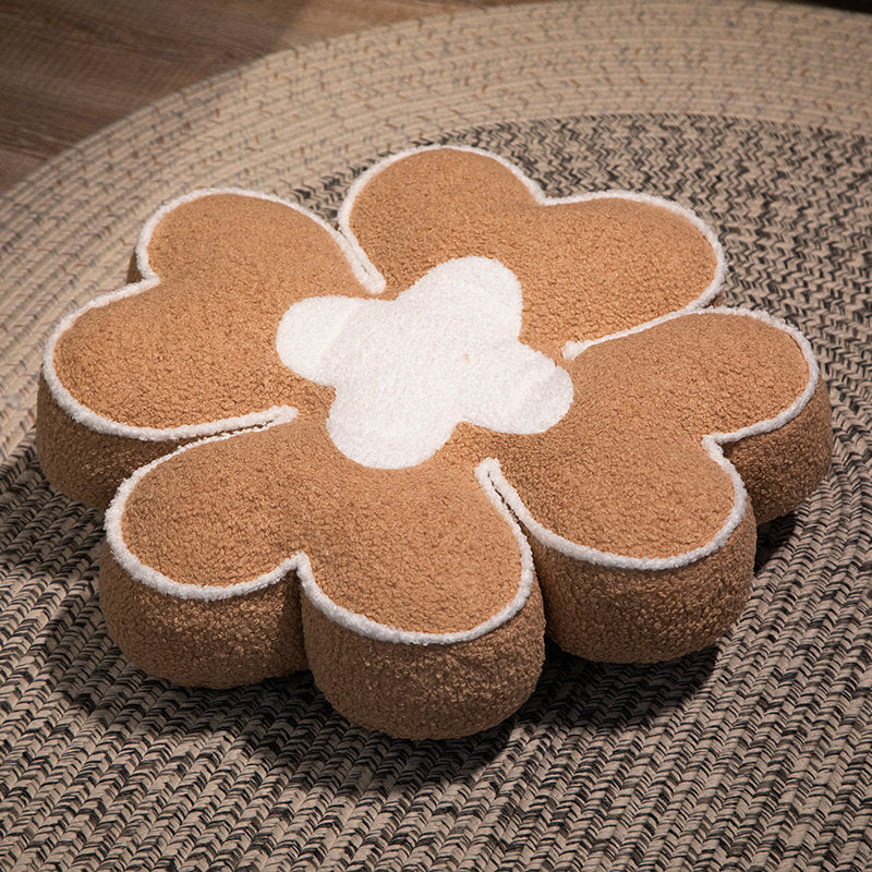 Padded seat cushion in flower shape with faux leather center piece and fluffy edge padding