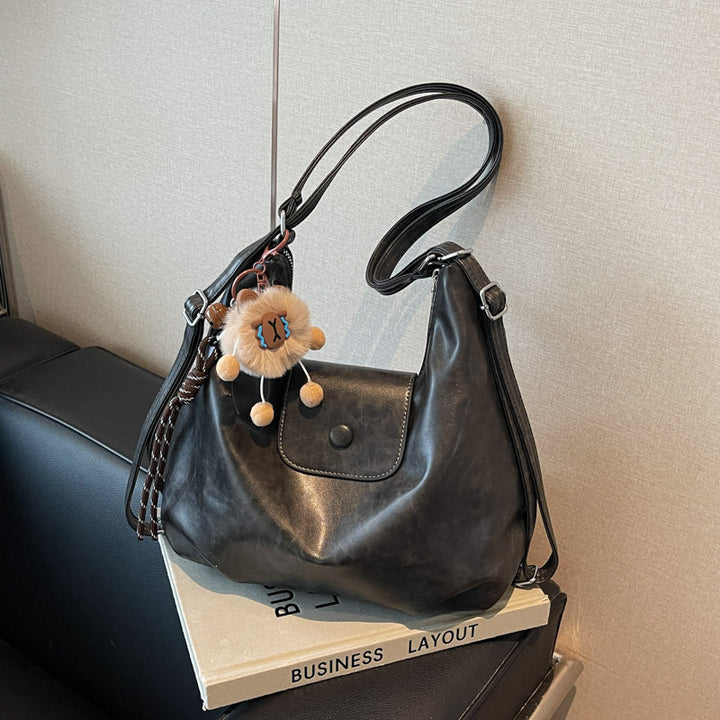 Modern shoulder bag with practical flap closure Kalsten
