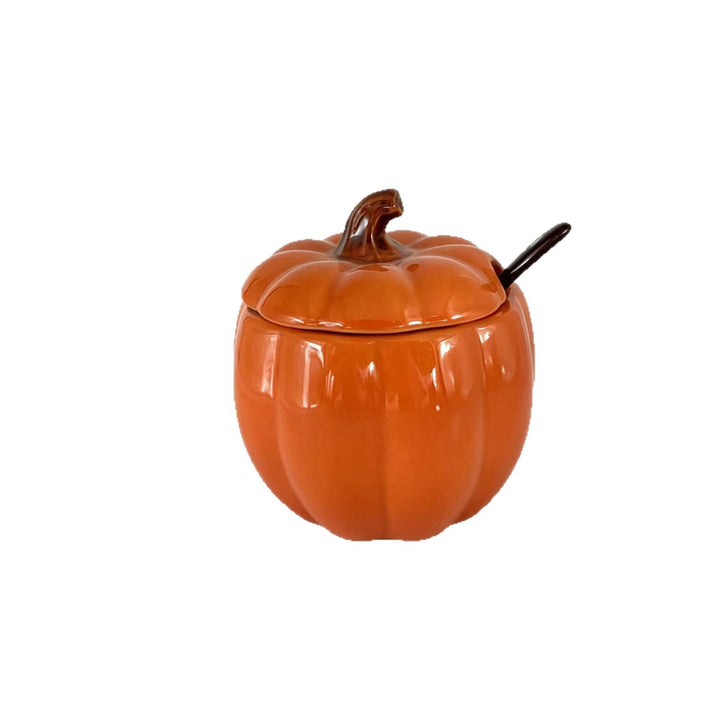 Ceramic storage jar in pumpkin shape with lid and spoon