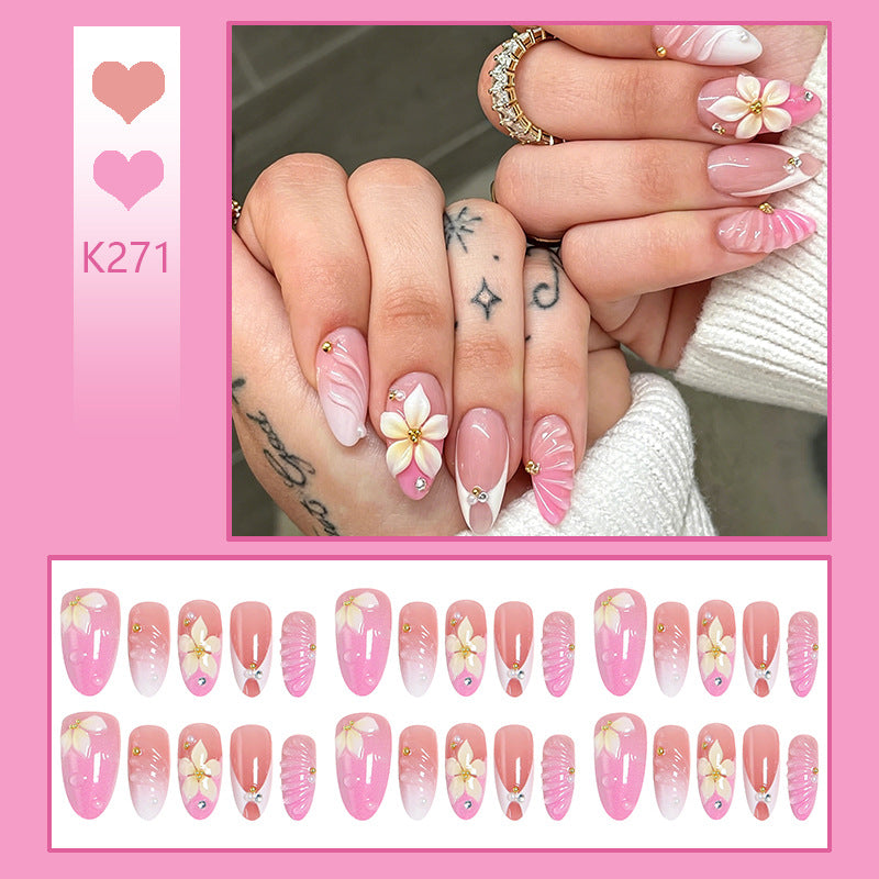 Nail art set with filigree flower patterns and sparkling accents Kalsten