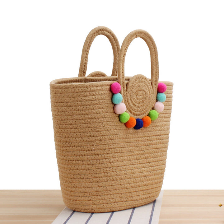 Fashionable handbag with playful pompom decoration Kalsten