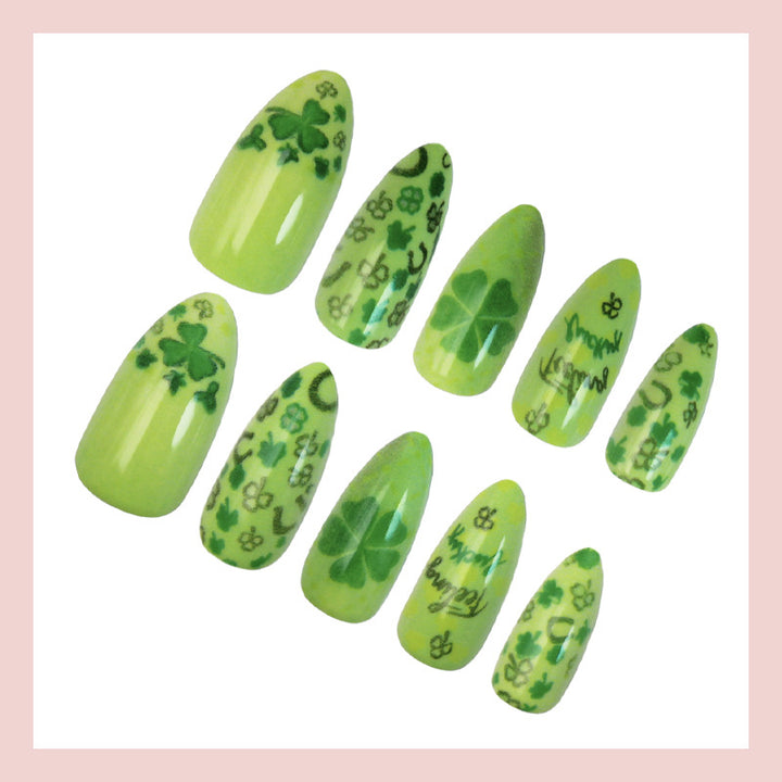 Art nail set with cheerful clover designs and casual lettering motifs Kalsten