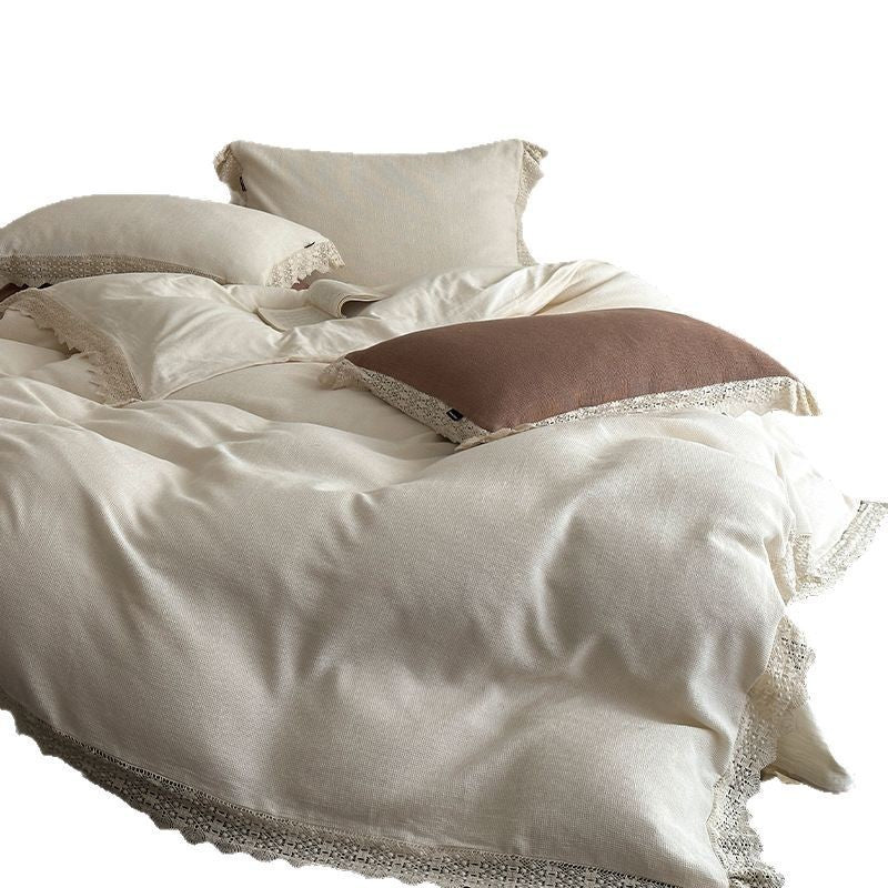 Bedding set with crocheted lace trim and linen look