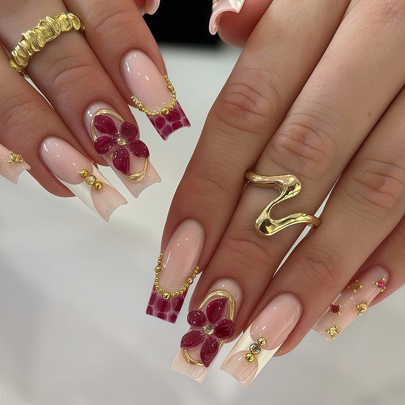 Artificial nail set with floral decorations and elegant accents Kalsten