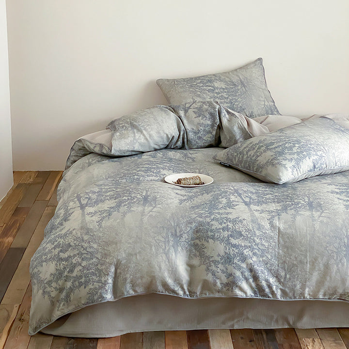 Bed linen set made of cotton satin with delicate branch and leaf print