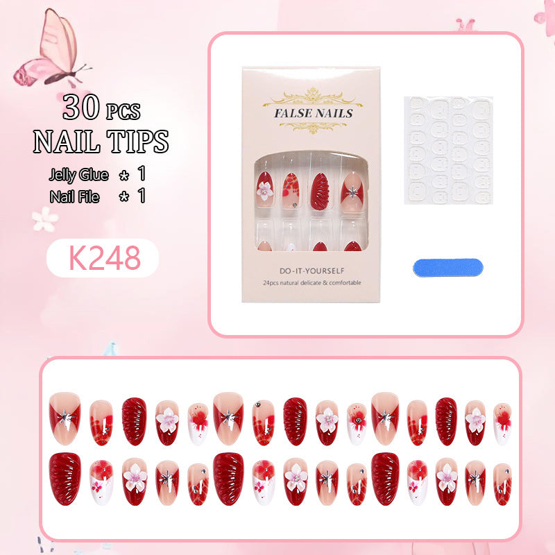 Luxury designed artificial nails with flower accents Kalsten