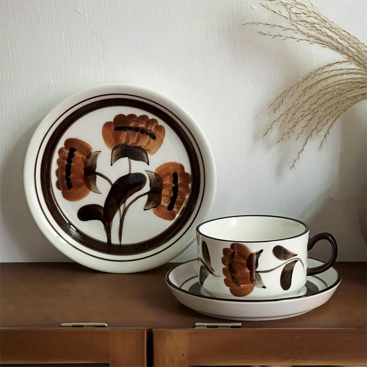 Porcelain cappuccino set with botanical brush painting and elegant rim decoration