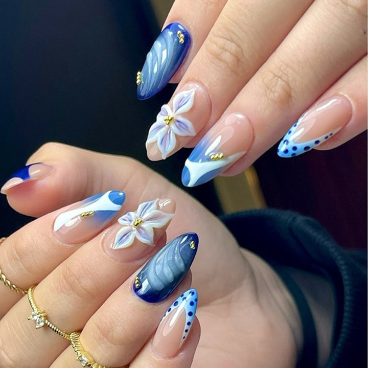 Nail set with creative floral design and sparkling accents Kalsten
