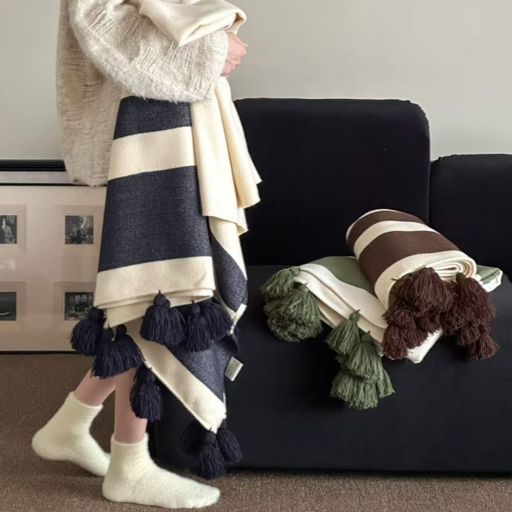 Soft woven blanket with tassels and diagonal stripes