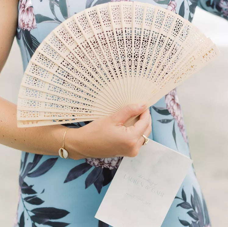 Ladies fan made of delicate plastic with artistic cut pattern Kalsten