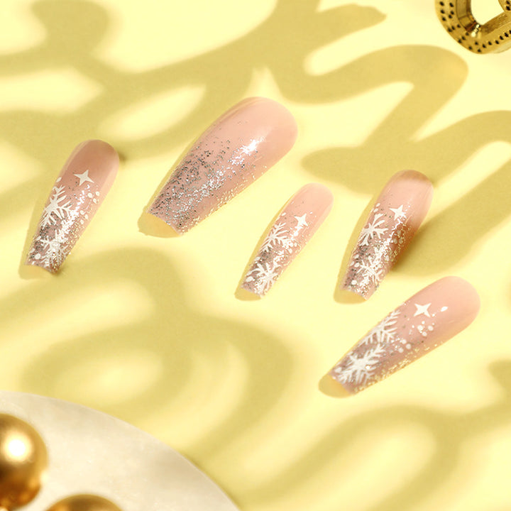 Artful nail art in winter design with glitter and snowflakes Kalsten