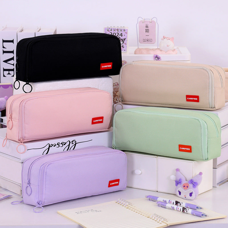 Pencil case with double zipper and variable compartment arrangement Kalsten