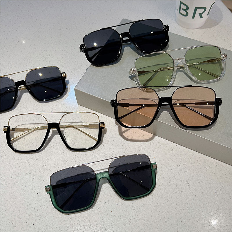 Women's square sunglasses with transparent frame and green tinted lenses Kalsten