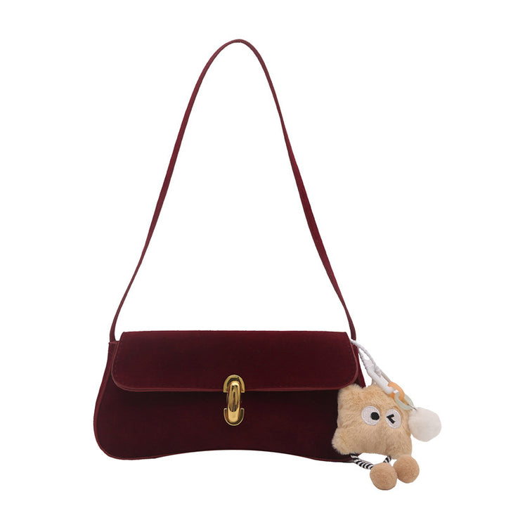 Elegant Suede Handbag with Playful Keychain