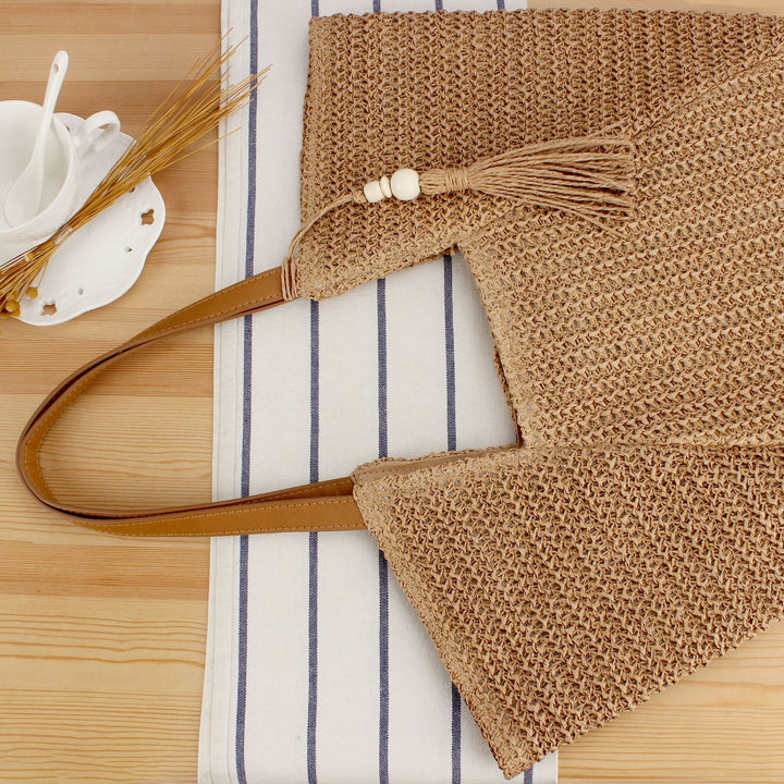 Handbag Made of Handwoven Raffia with Elegant Leather Accents Kalsten
