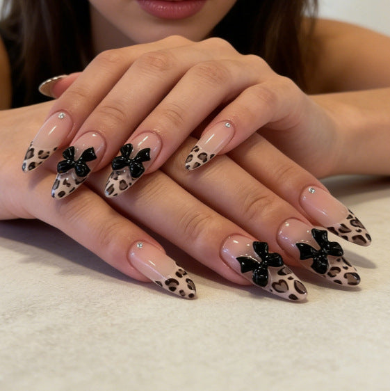 Artificial nail tips with elegant leopard pattern and bow decoration Kalsten