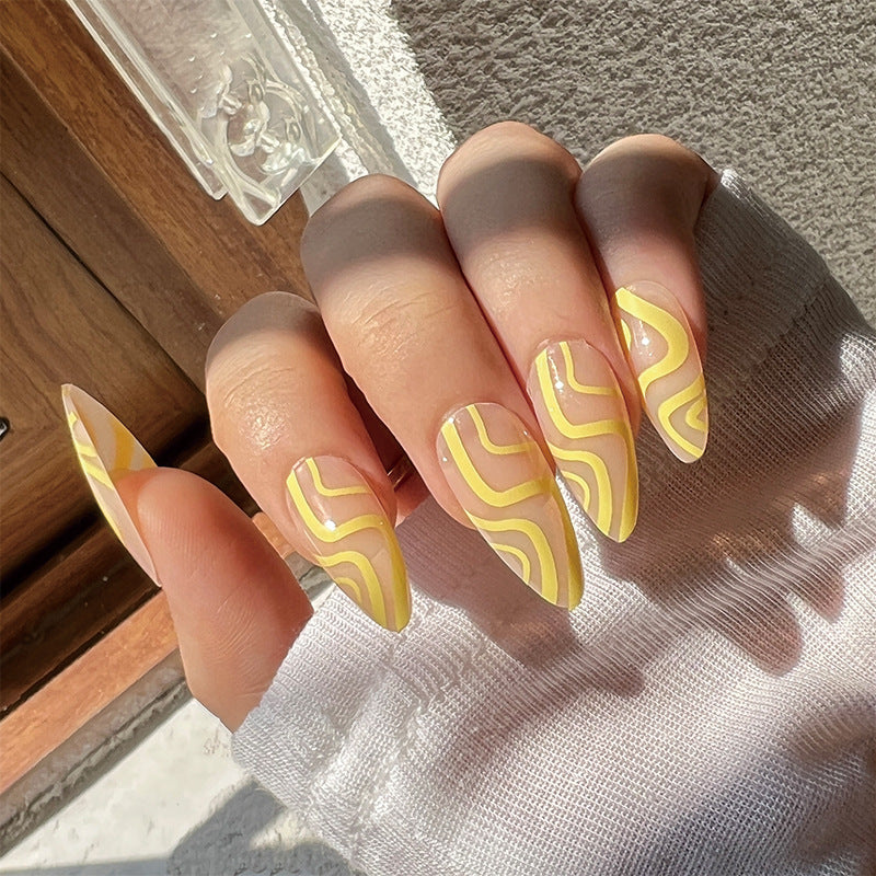 Artful Stiletto Nails with Modern Wave Design Kalsten