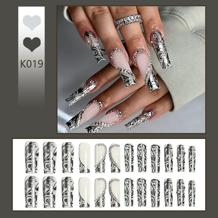 Elegant artificial nails with stylish embellishments Kalsten