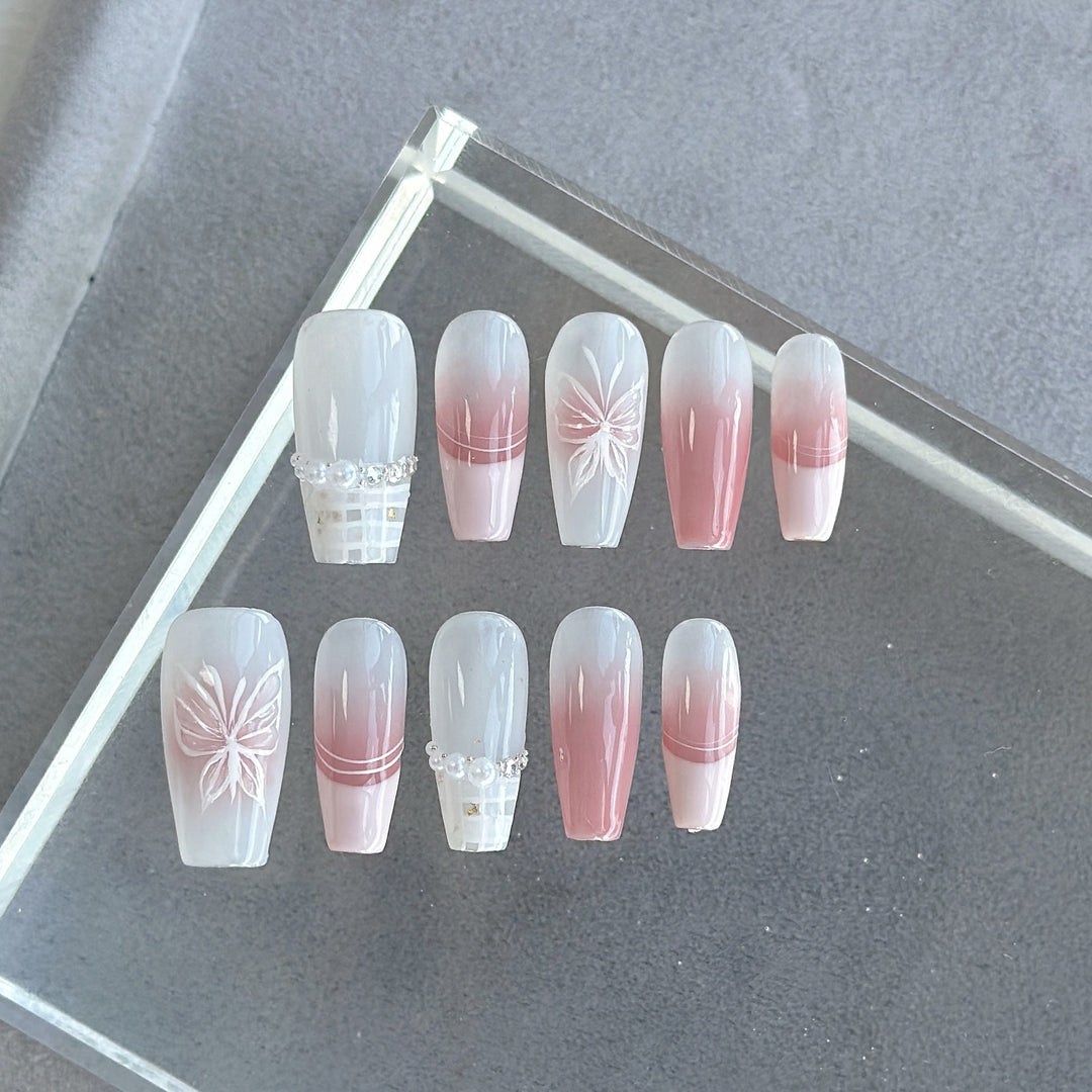 Artistic Press-On Nail Art Set with Heart and Celestial Designs