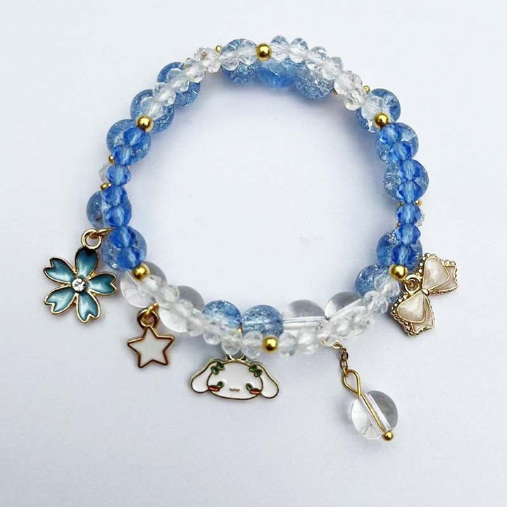 Elegant bracelet with animal and glitter pendants Kalsten