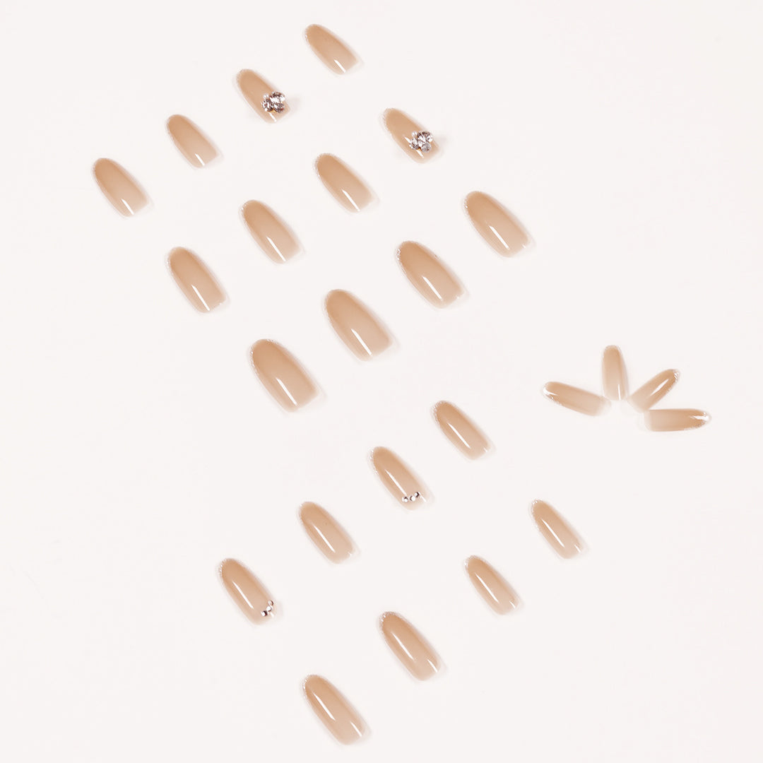 Artful Nail Art with Rhinestone Embellishments Kalsten