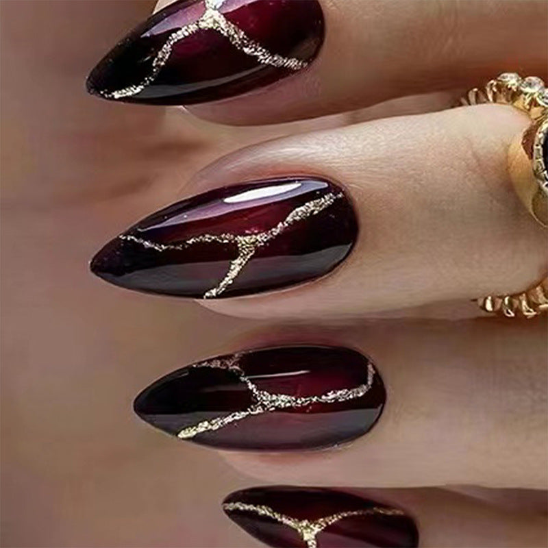 Elegant artificial nails with golden accents Kalsten