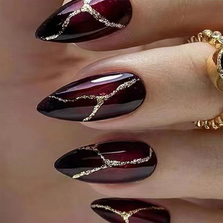 Elegant artificial nails with golden accents Kalsten