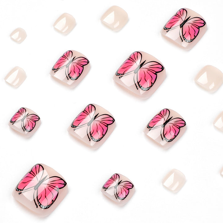Artful toenail design with butterfly design Kalsten