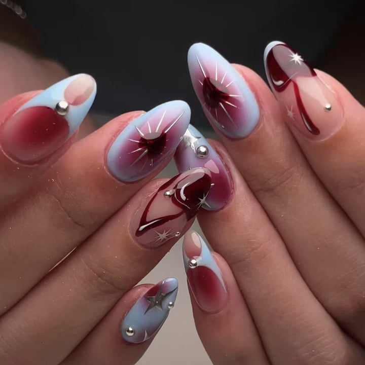 Creative nail art set with artistic color gradients and glitter embellishments Kalsten