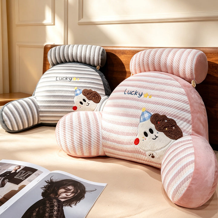 Ergonomic bed and reading pillow with neck roll, armrests and embroidered dog motif