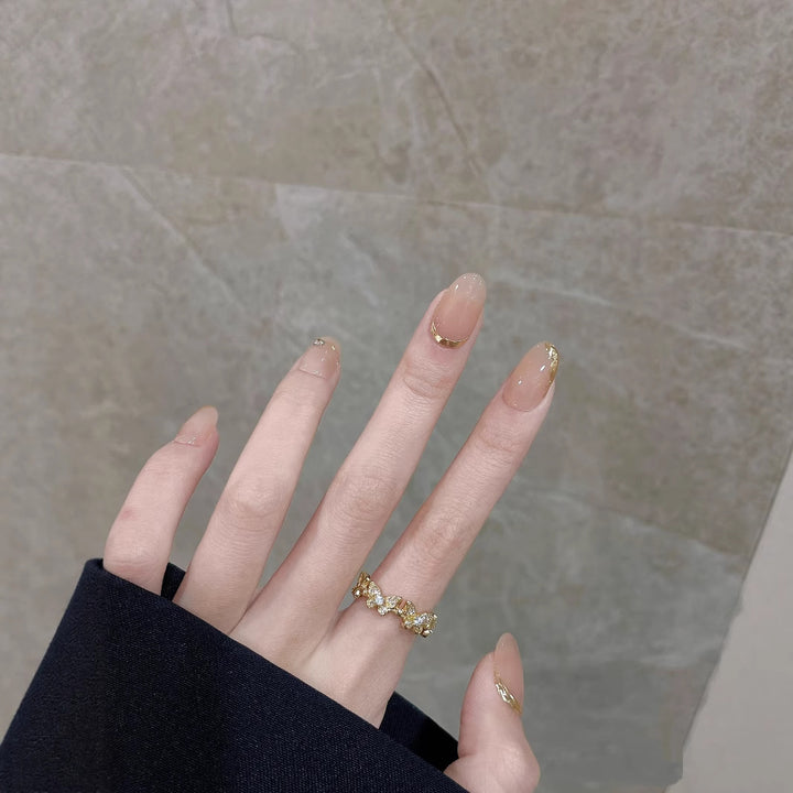 Artistic Press-On Nail Set with Elegant Metallic Garnishes