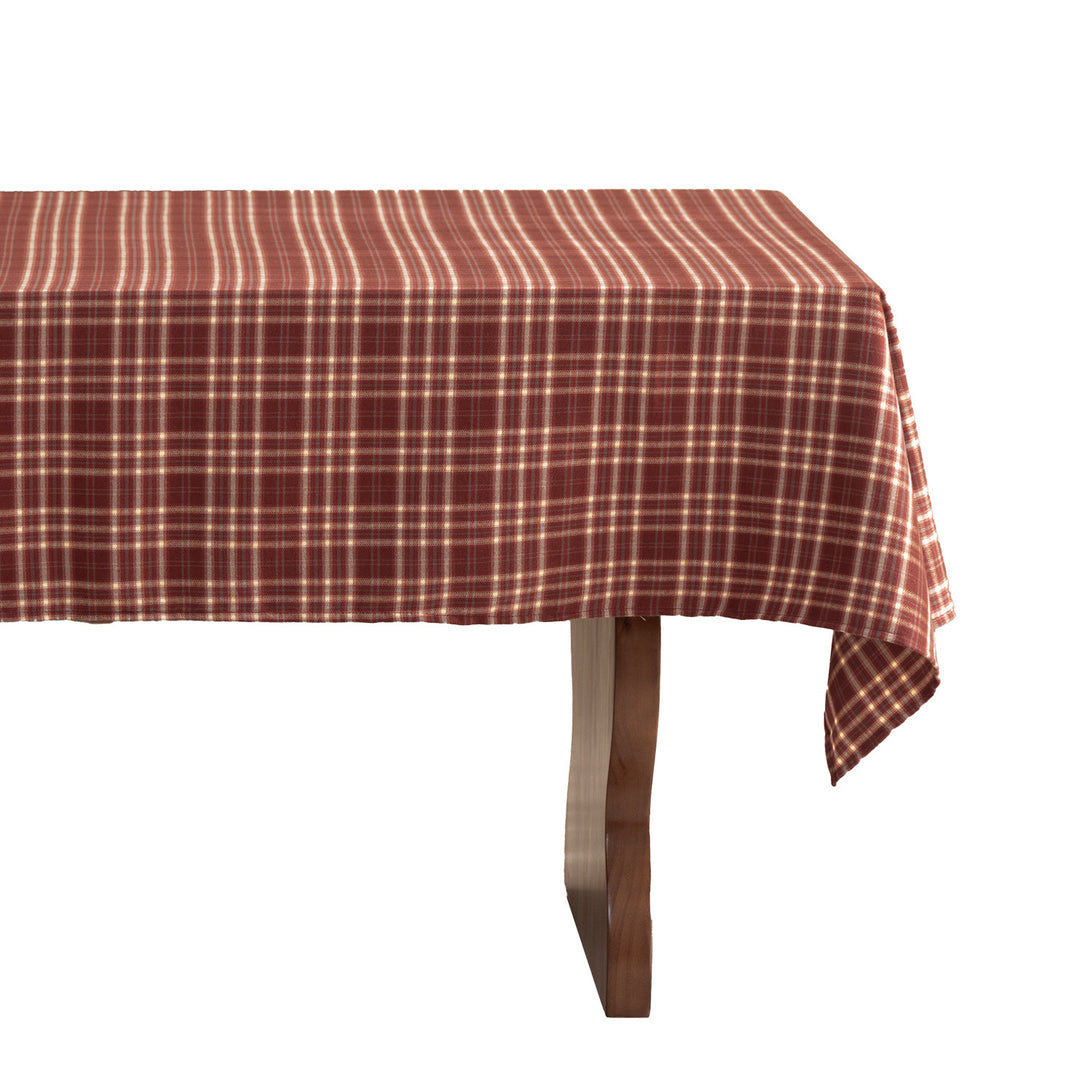Checked flannel tablecloth with pom-pom tassels and traditional tartan pattern