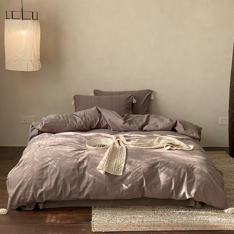 Finely textured cotton satin bedding set with tone-on-tone relief