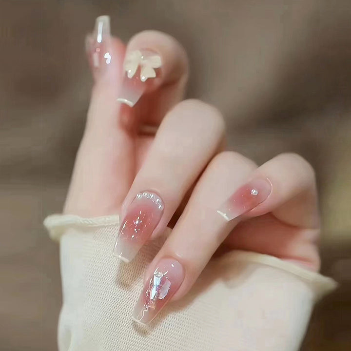Glamorous artificial nails with sparkling accents Kalsten