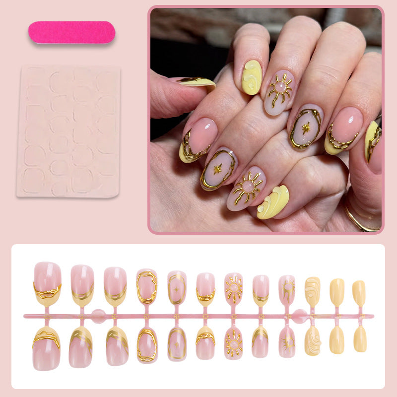 Acrylic nail set with elegant gold embellishments and creative designs Kalsten