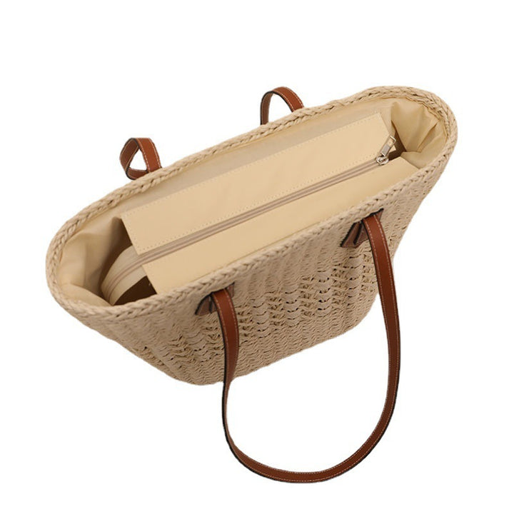 Handcrafted rattan basket bag with elegant leather accents Kalsten